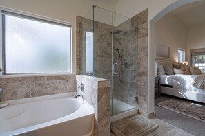 Bathtub, hair dryer, towels, soap