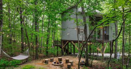 Serenity Escape Treehouse on 14 Acres with easy trails, fire pit and hammock.