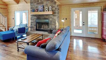 Cabin, Multiple Beds, Patio | Living area | TV, fireplace