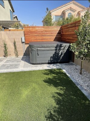 Enjoy a serene outdoor space with a well-manicured lawn and a yard.