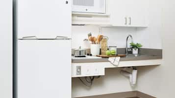 Full-size fridge, microwave, dining tables