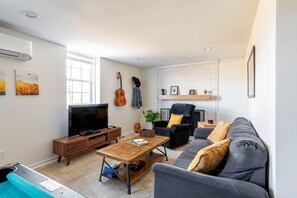 Smart TV, DVD player, books, video library