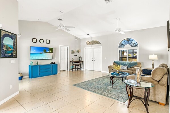 TV - Villa Blue Coral Oasis - Great outdoor living area! Elect-heated pool & fenced yard - SWFL Rentals (Cape Coral)