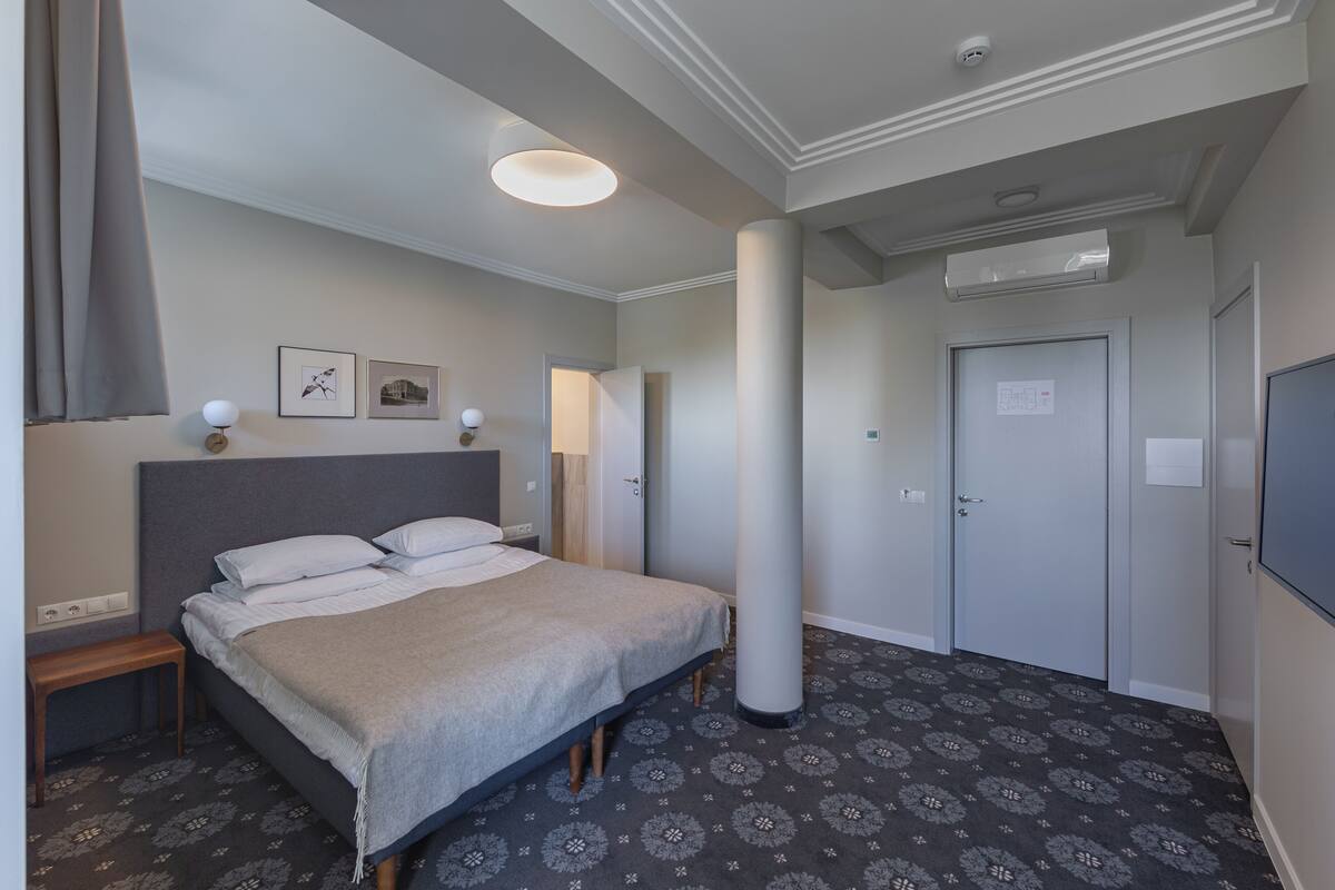 Business kamer | Een kluis op de kamer, verduisterende gordijnen