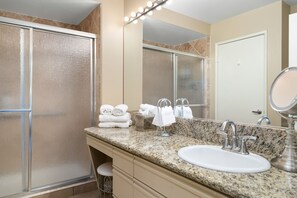 Combined shower/tub, hair dryer, towels, shampoo