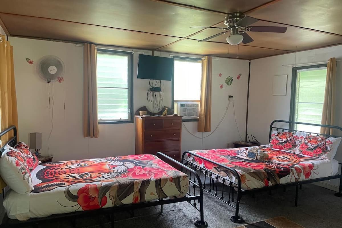 Habitación Deluxe | Escritorio, espacio para trabajar con un portátil, cuna de viaje