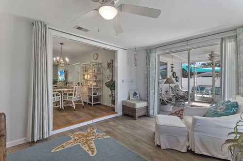 Cozy two-bedroom cottage by Nokomis Beach. Sleep 8.