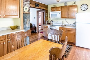 Fridge, microwave, oven, stovetop - Creekside Cabin with Free WiFi, Firepit, Full Kitchen, & Private W/D - Dogs OK (Bryson City)