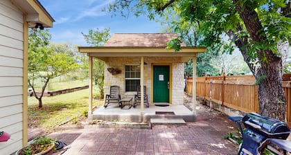 Cozy & Cute Cabin with Fenced Patio, Grill, AC & WiFi - Walkable Locale