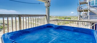 Oceanfront home w/elevator, private hot tub, shared pool, beach access, & WiFi