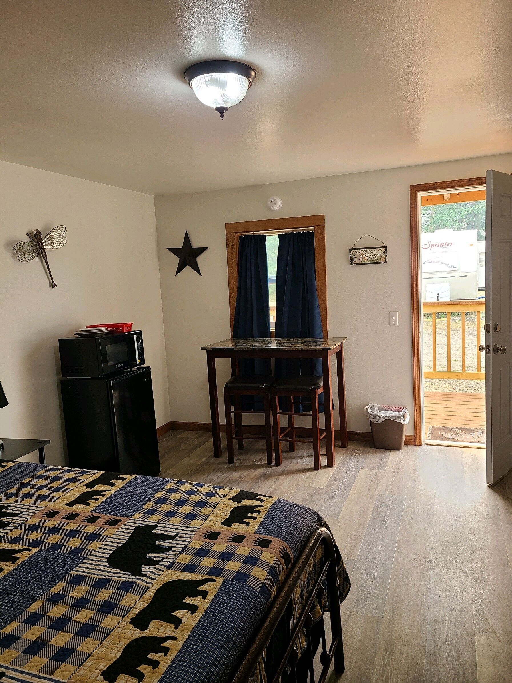 Dry Cabin w/ Short Walk To Bathroom, Queen Bed w/ Fridge & Microwave | Individually decorated, individually furnished, free WiFi, bed sheets