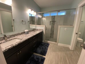Combined shower/tub, hair dryer, towels, toilet paper