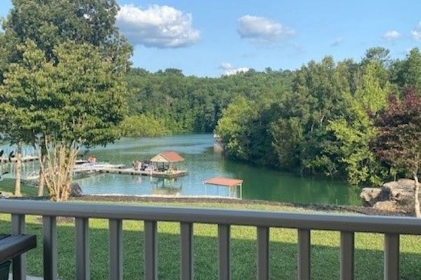 View from front porch. Boat slip immediately to the left of swim platform