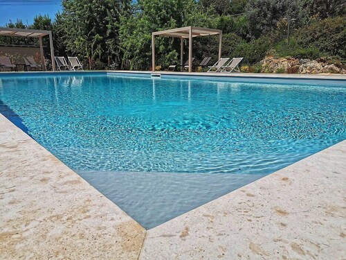 Casa Raissa B: A characteristic and welcoming apartment that is part of a villa immersed in a splendid landscape, in a lovely little hamlet, with Free WI-FI.