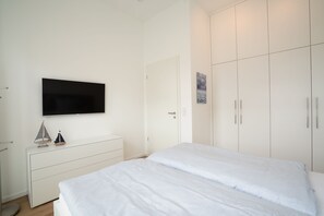 2 quartos, cofres nos quartos, berço de viagem, Wi-Fi