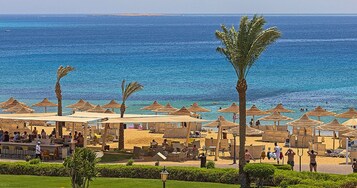 Private beach, sun loungers, beach umbrellas, beach towels