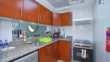 Studio | Private kitchen | Full-sized fridge, microwave, stovetop, coffee/tea maker