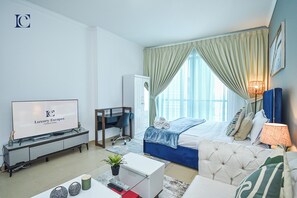 Studio | Living room | 41-inch Smart TV with cable channels, TV - Lake View Brand New Studio in X1 Tower JLT - LND (Dubai)
