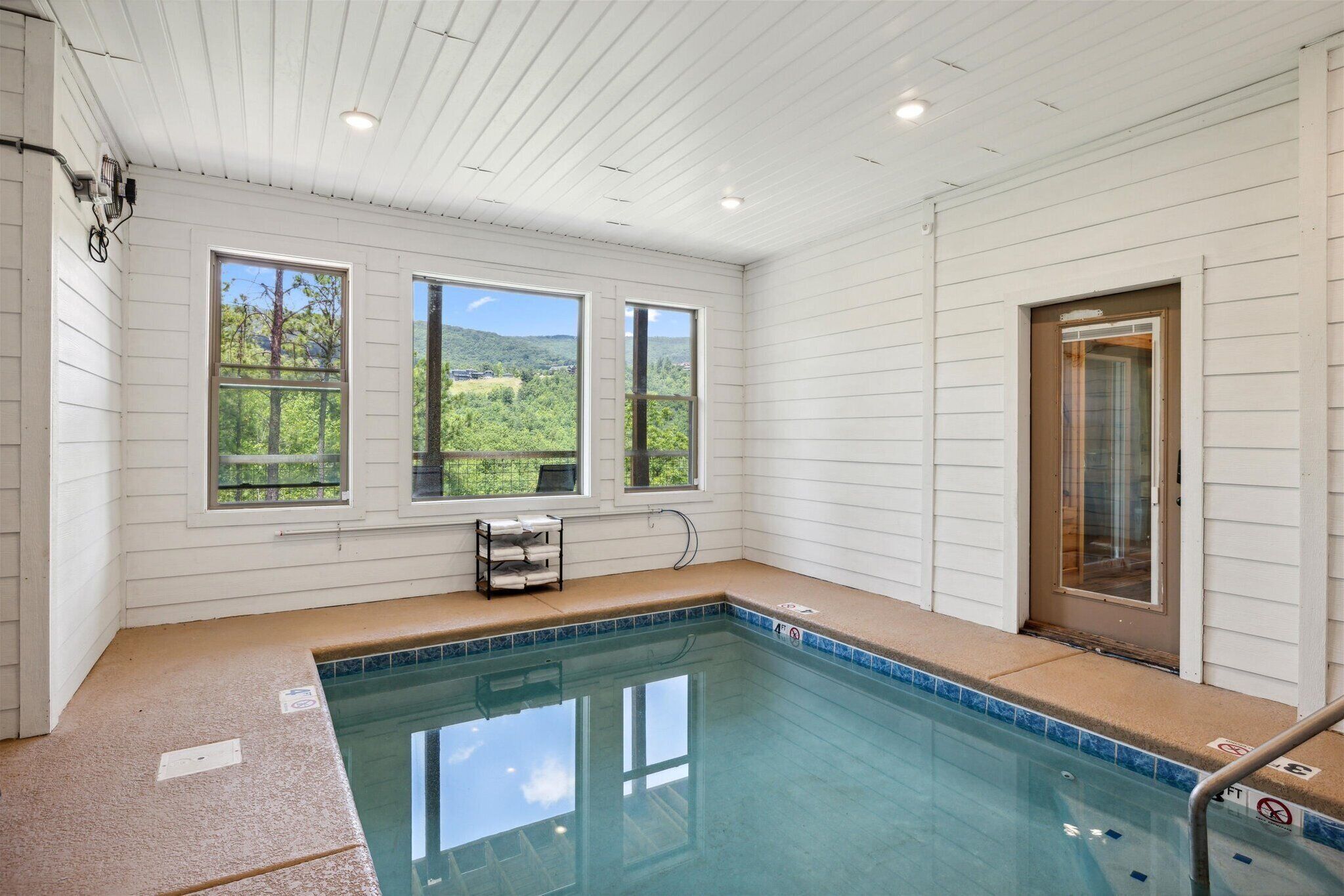 Make a splash in the indoor heated pool | Big Pine Chalet  | Great Smoky Mountain Cabin Rentals | Gatlinburg Cabin Rentals | Pigeon Forge Cabin Rentals | Cabins with pools