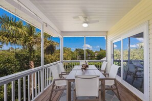 Outdoor dining - Anna Maria Escape! Pool, Spa, and Canal Views - Our Tern (Anna Maria)