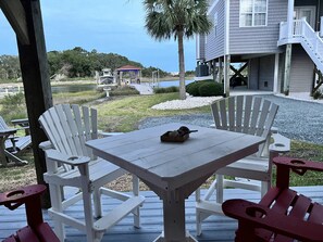 Outdoor dining - Boat lovers dream rental.....Lovely home on ICW. Boat lift, Tesla charger (Surf City)