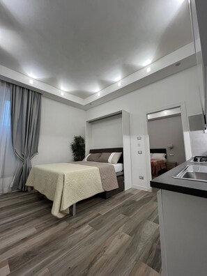 1 chambre, fer et planche à repasser, accès au Wi-Fi (inclus)