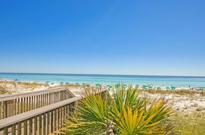 A beach with a wooden boardwalk, clear blue sky, and turquoise ocean. - ⭐Private Beach Access-Water Views-Complex Pool-Gulfview I 216- Just Beachy⭐ (Destin)