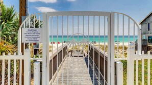 A gated entrance to a beach property named Gulfview, with a wooden boardwalk leading to the beach. - ⭐Private Beach Access-Water Views-Complex Pool-Gulfview I 216- Just Beachy⭐ (Destin)