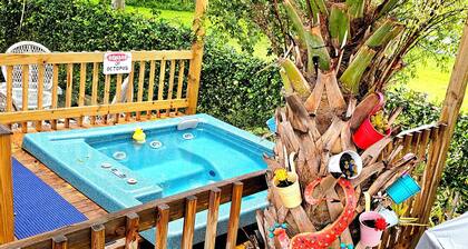 Good Times! Beach cottage with hot tub, walk to beach! Unique amenities!