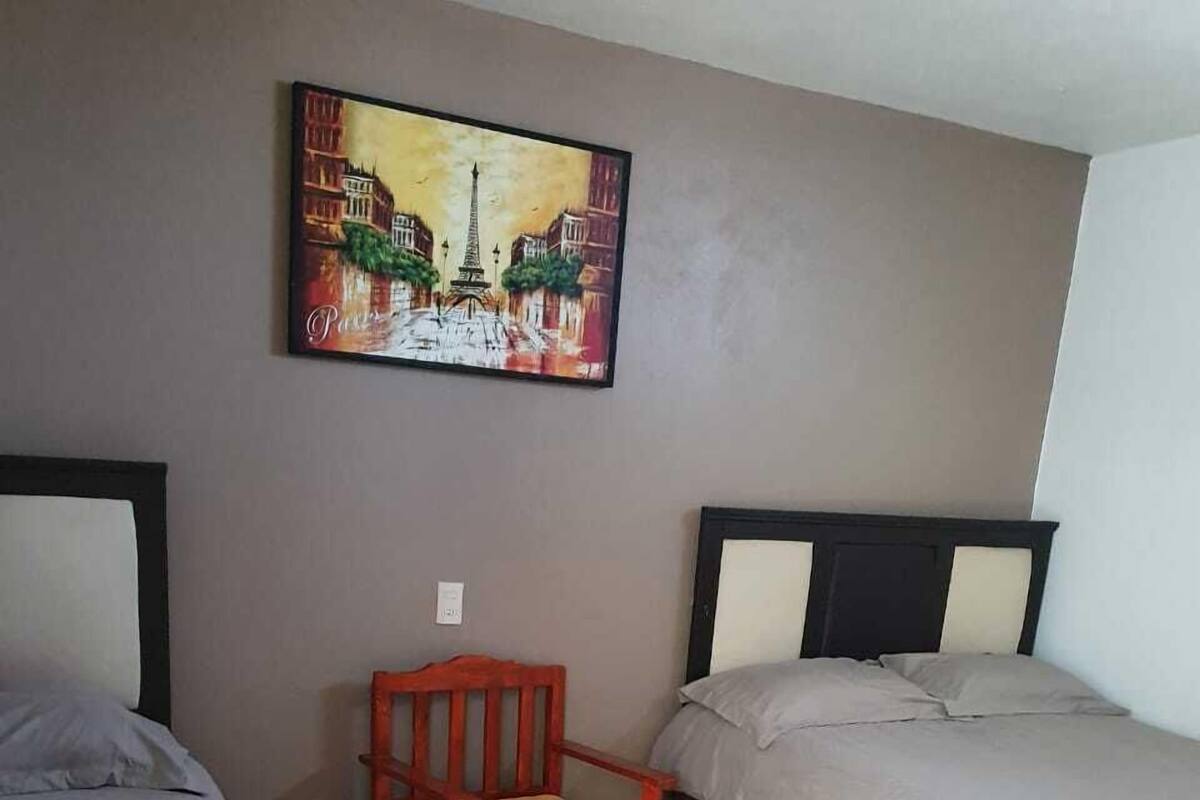 Habitación cuádruple familiar, 2 camas dobles | Edredones de plumas, wifi gratis, ropa de cama