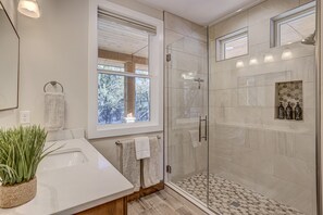 Combined shower/tub, hair dryer, towels, soap