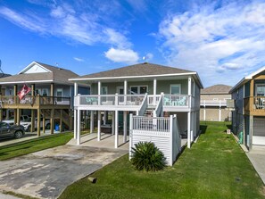 Enjoy a retreat with a spacious balcony, well-manicured lawn, and secure driveway.