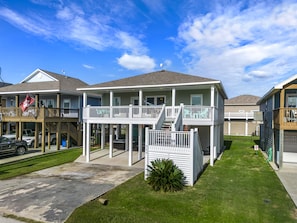 Enjoy a retreat with a spacious balcony, well-manicured lawn, and secure driveway.