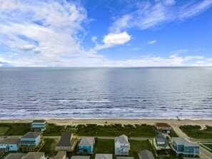 Enjoy ocean views from this two-story beachfront home.