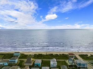 Enjoy ocean views from this two-story beachfront home.