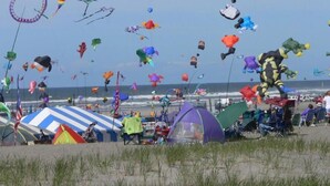 A beach with colorful kites and tents. - Long Beach WA  Oceanfront 4th of July week (Long Beach)