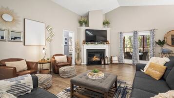 Smart TV, fireplace, books