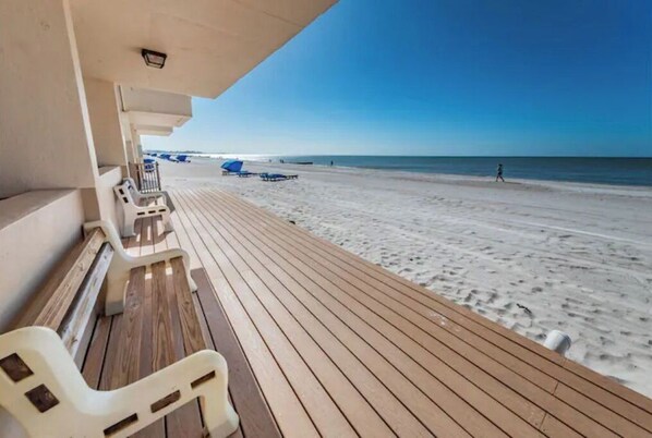 On the beach, sun loungers, beach towels