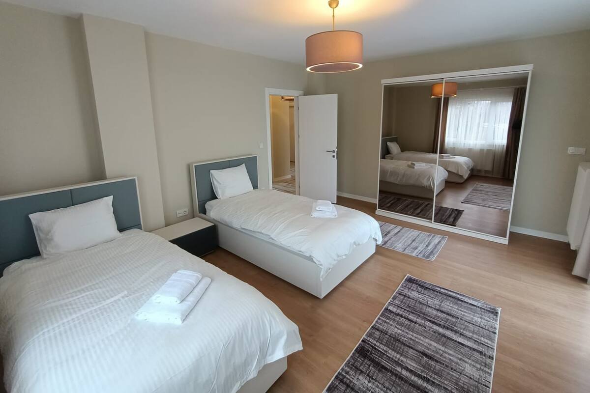 4 bedrooms, blackout curtains, iron/ironing board, free WiFi