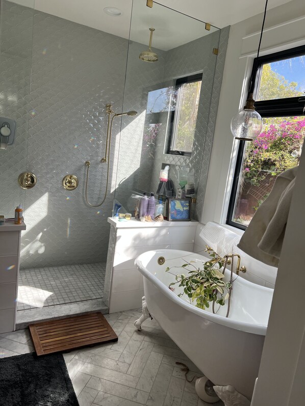 Bathtub, hair dryer, towels, soap
