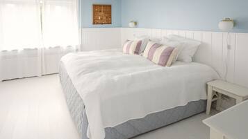 Habitación doble Confort, 1 cama King size, vista al jardín | Ropa de cama de alta calidad y camas con pillow-top