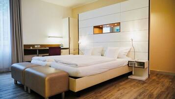 Literie hypoallergénique, minibar, coffres-forts dans les chambres