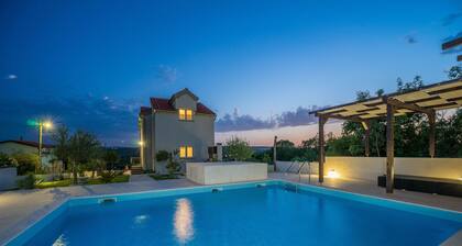Holiday home with swimming pool