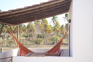 Superior Suite, Pool View | Lanai - Zero Meia Um pousada (São Miguel do Gostoso)