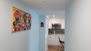 Fridge, microwave, coffee/tea maker, cookware/dishes/utensils