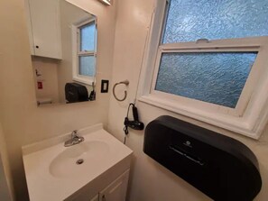 Shower, towels, toilet paper