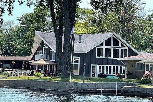 Beautiful lakefront home on Paw Paw Lake with direct water access and stunning views.