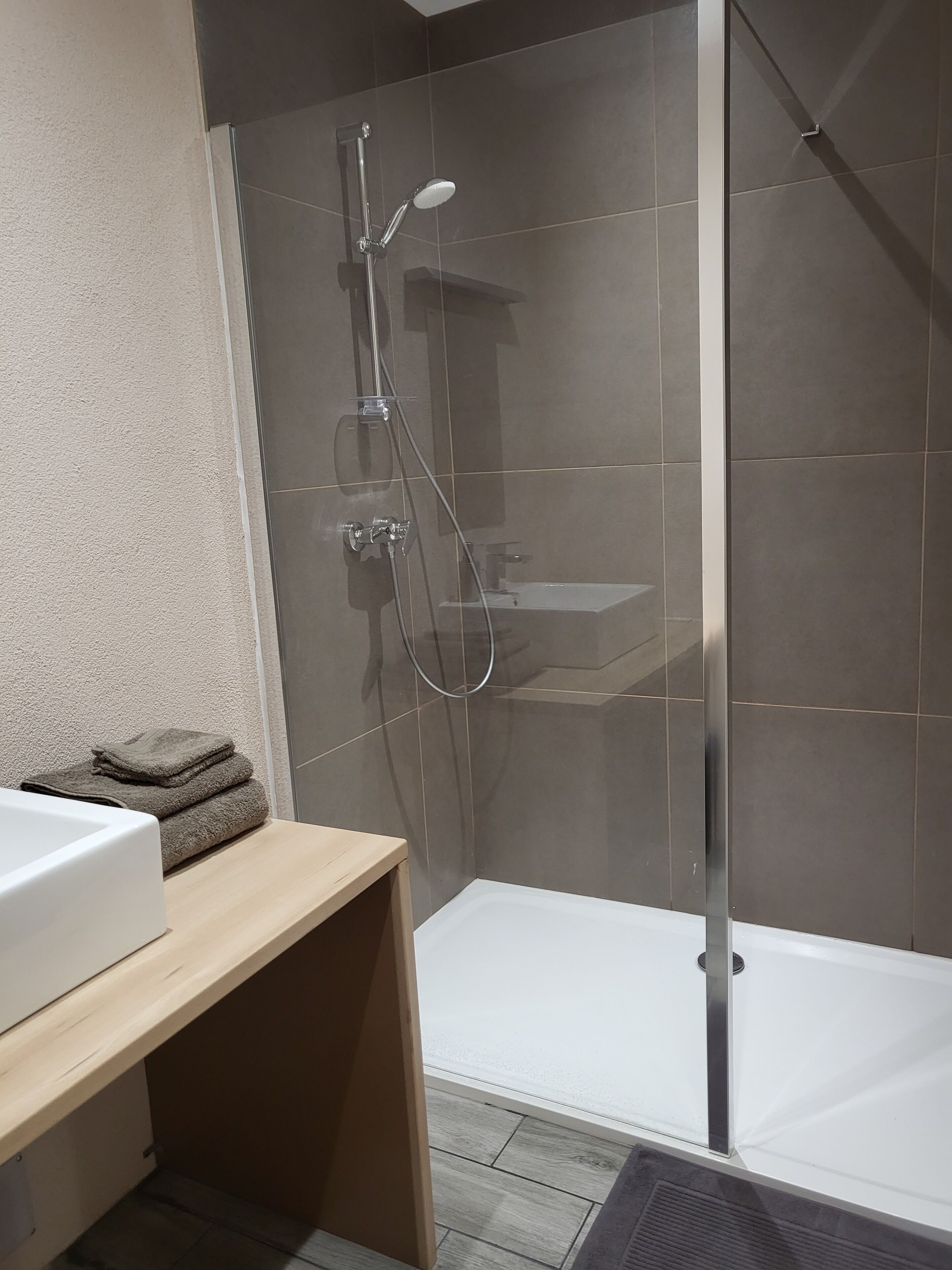 Bathtub, hair dryer, towels, soap
