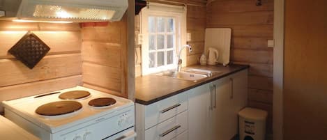 Fridge, stovetop, coffee/tea maker