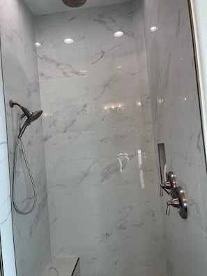 Combined shower/tub, hair dryer, towels, soap